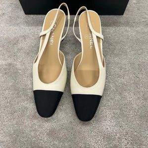 Chanel Classic Two Tone white Black Cap Toe Shoe